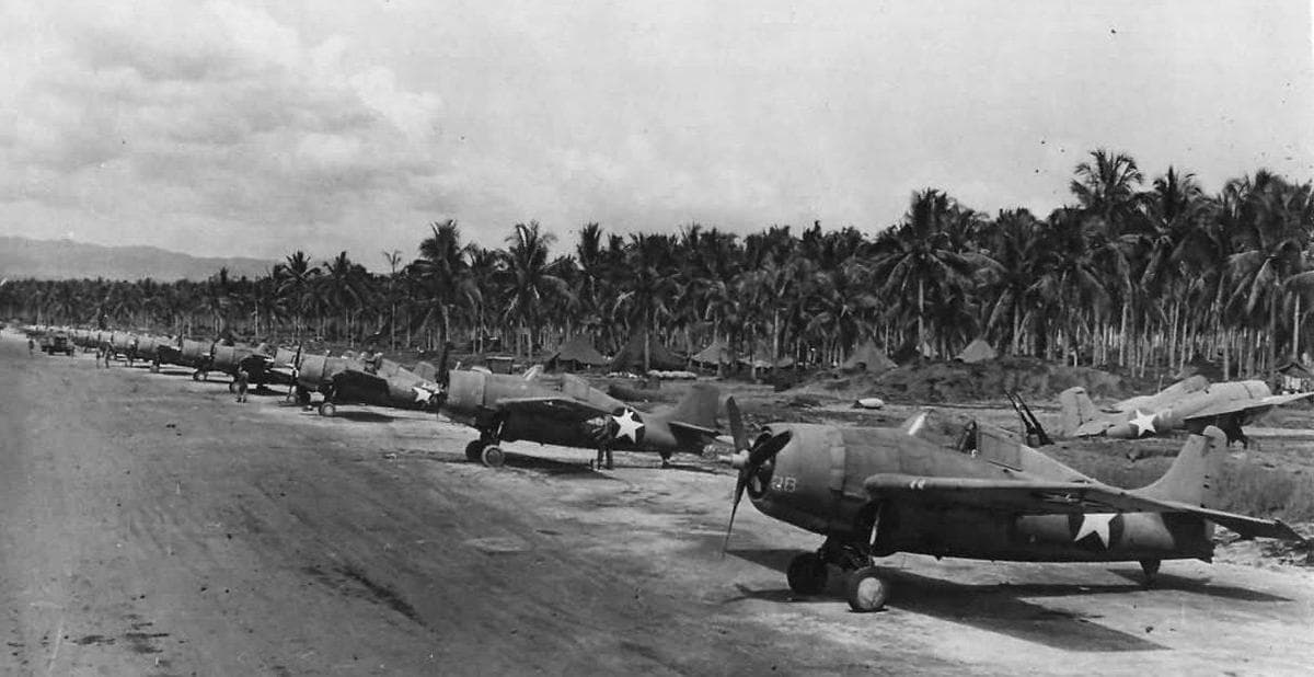 A long line of F4F Wildcat aircraft at Henderson Field on Guadalcanal in 1943.